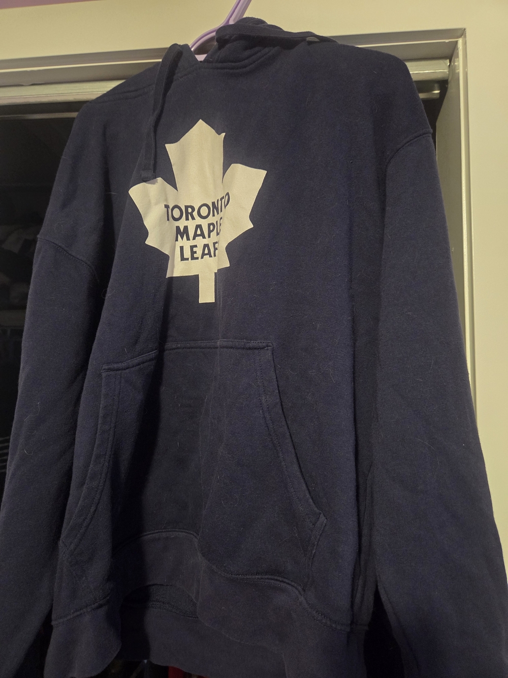 NHL Navy Pullover Hoodie with White Maple Leaf Logo
